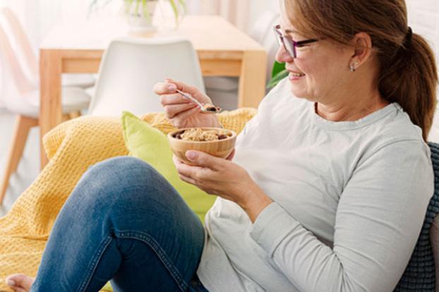 Sitting on couch with small breakfast