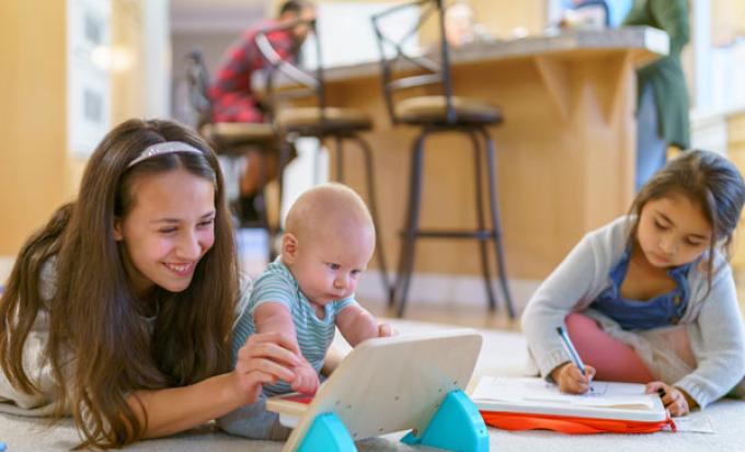 Babysitter with toddler and baby 