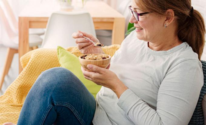 Sitting on couch with small breakfast