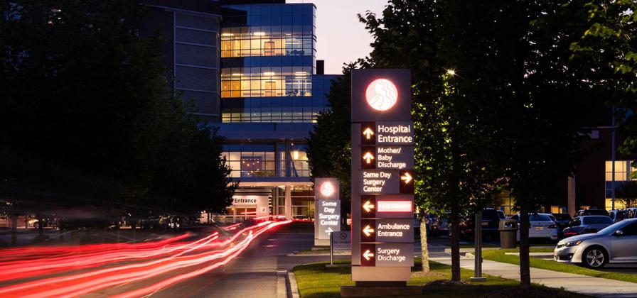 Exterior of Woman's Hospital at night.