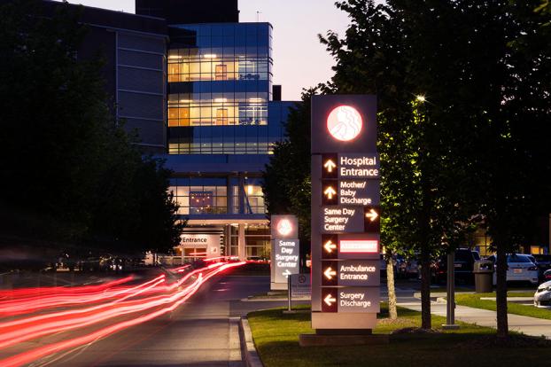 Exterior of Woman's Hospital at night.