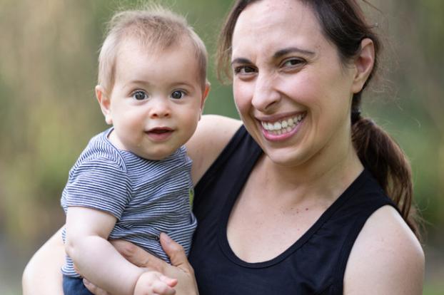 Holding baby and interested in research