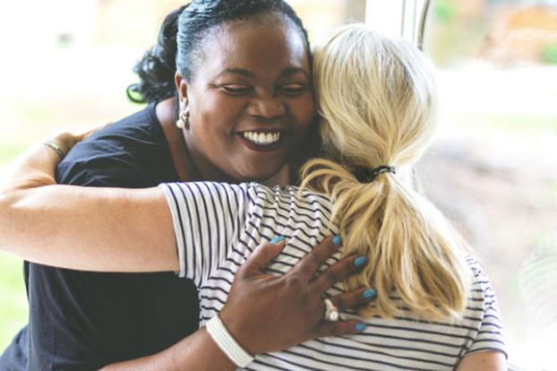 patient and nurse thank you hug